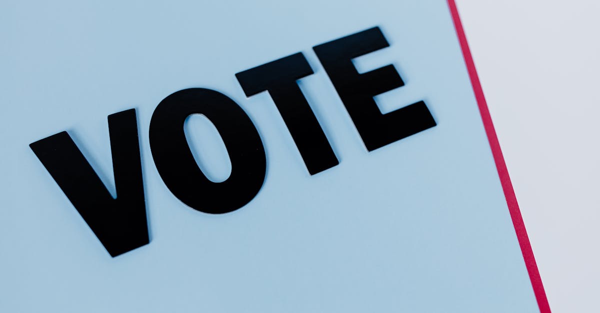 close up of the word vote on a minimal background emphasizing voting importance