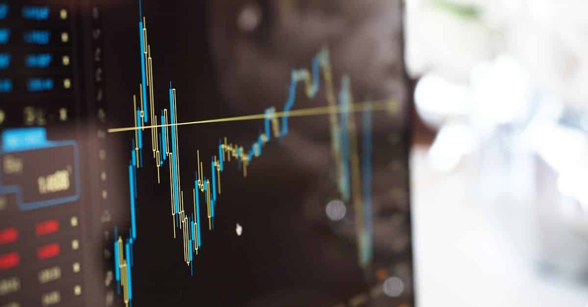 detailed view of financial trading graphs on a monitor illustrating stock market trends