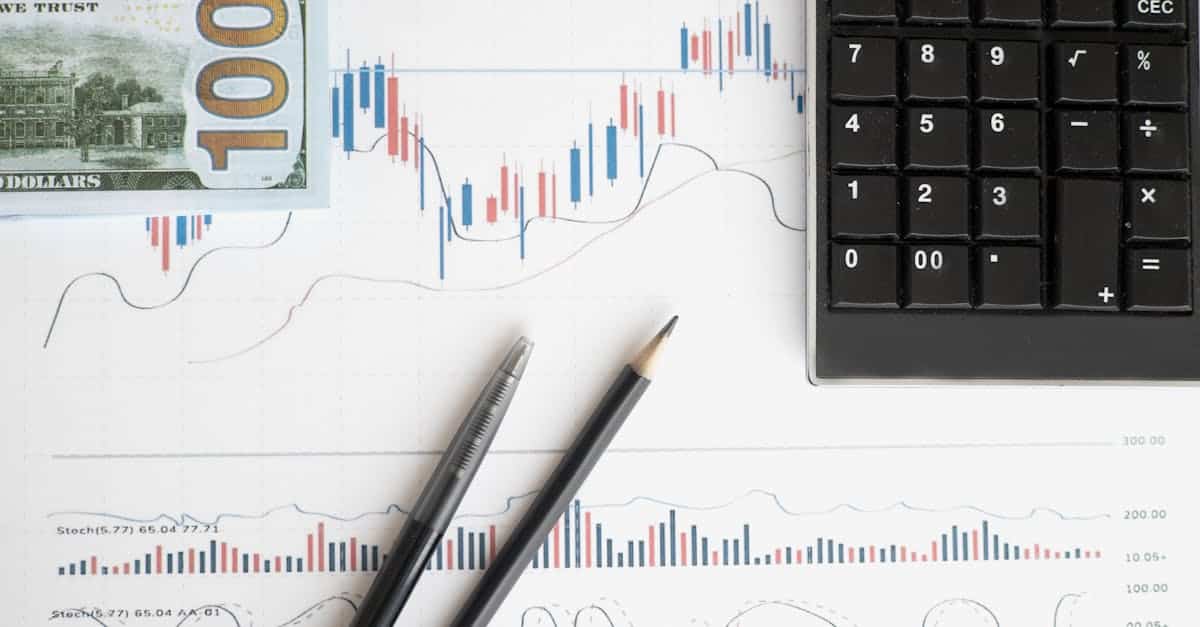 stock analysis workspace featuring charts a calculator and currency for data driven insights